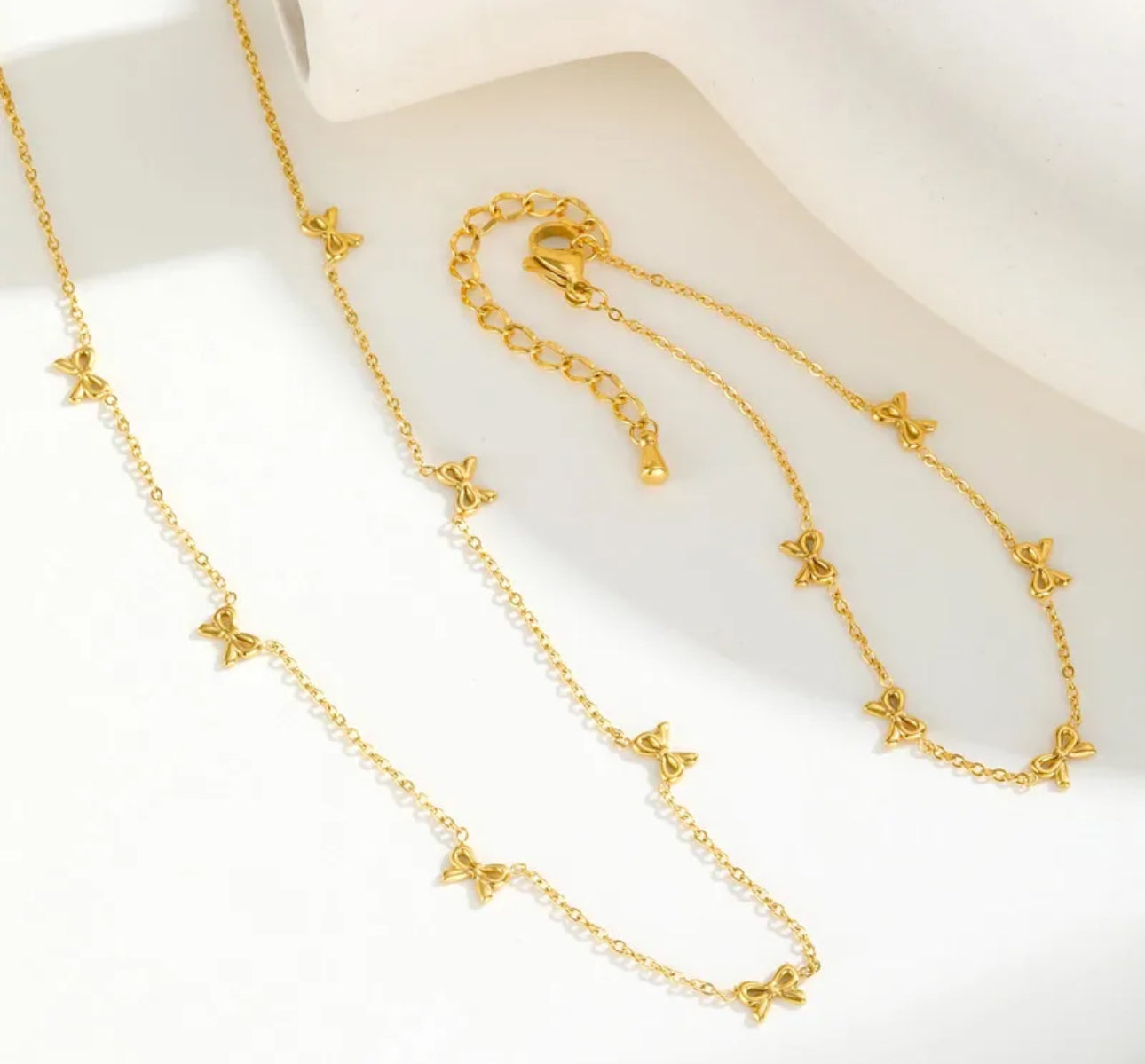 Set de cadena y pulsera con diseño de lazos🎀